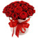 красные розы в шляпной коробке. Папуа-Новая Гвинея